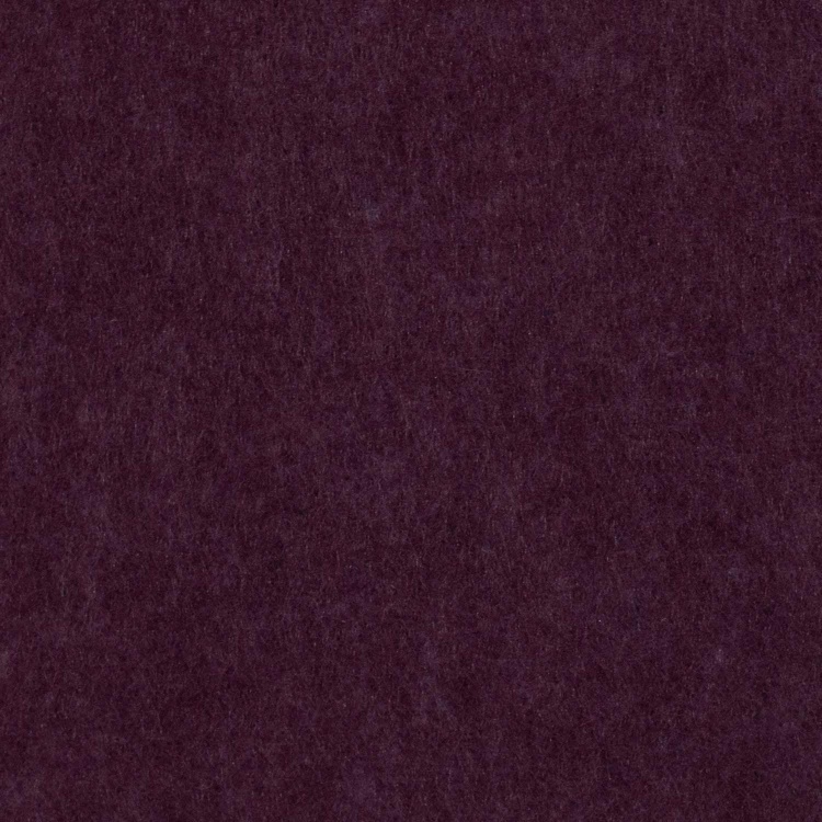 Close-Up of a Dark Textured Surface in Soft Lighting
