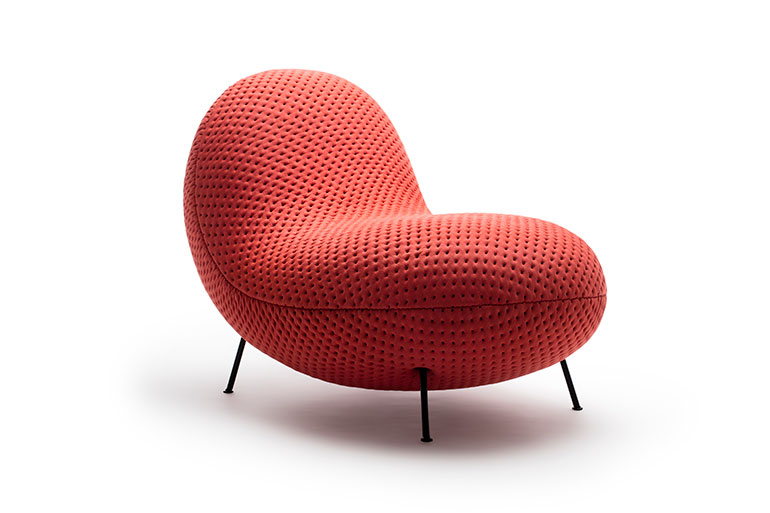 Red Modern Chair with Textured Fabric and Sleek Black Legs