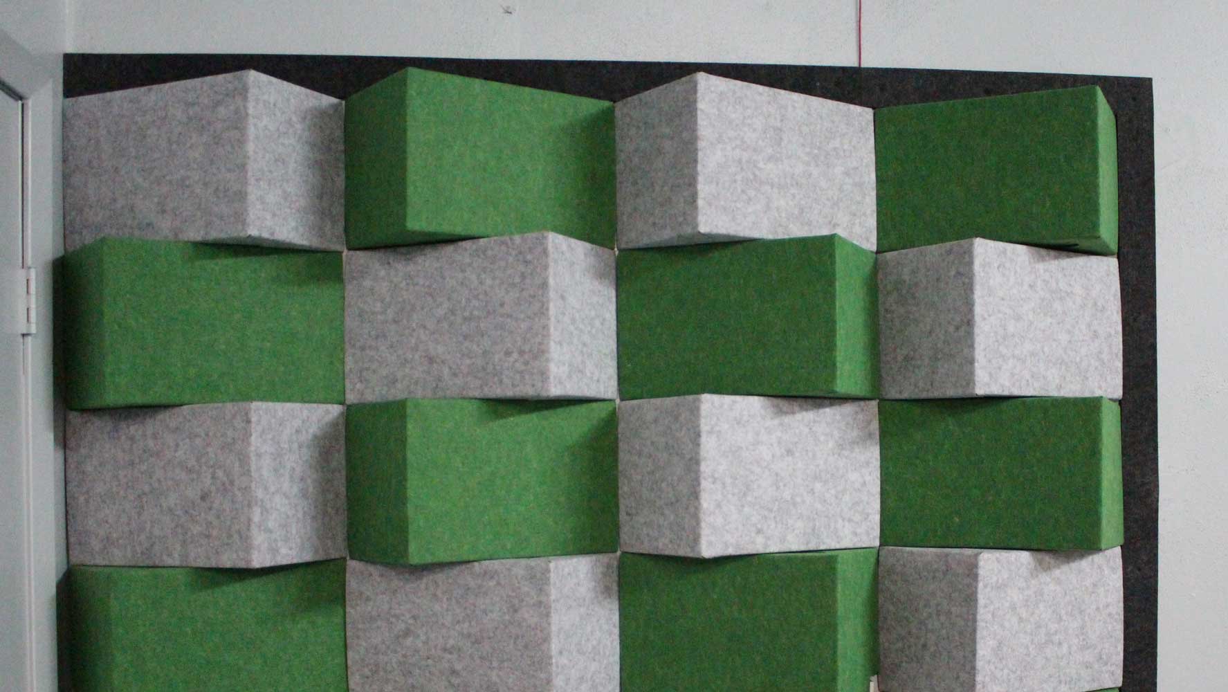 Green and Grey Folding Panels Mounted on a Wall