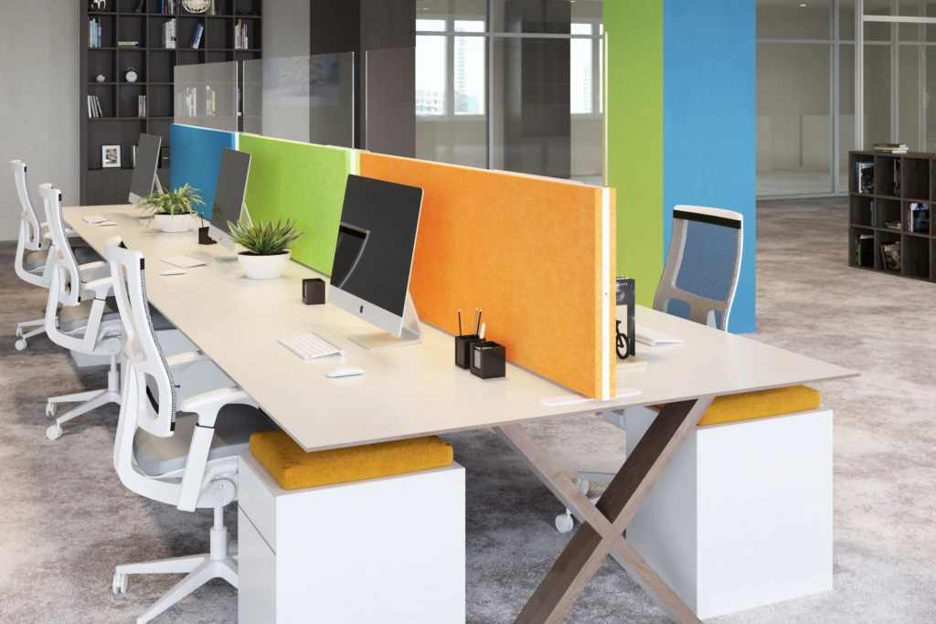Colorful Modern Office Space with Desks, Computers, and Privacy Panels